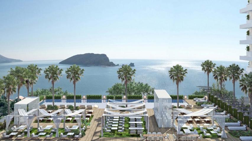 Luxury hotel with 212 residences, 144 rooms, and prime location near beach & city center