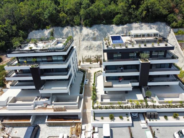 OPATIJA, ZENTRUM - 143 m² große exklusive Wohnung in einem neuen Gebäude mit privatem Pool und Panor