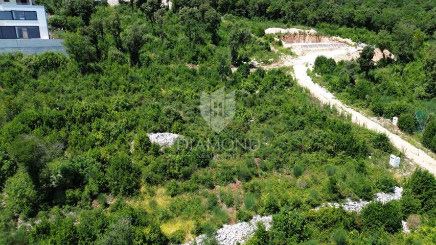 Labin, surroundings, building plot with sea view