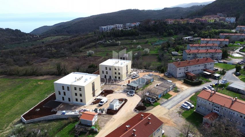 Labin, luksuzni stan u novogradnji s pogledom na more