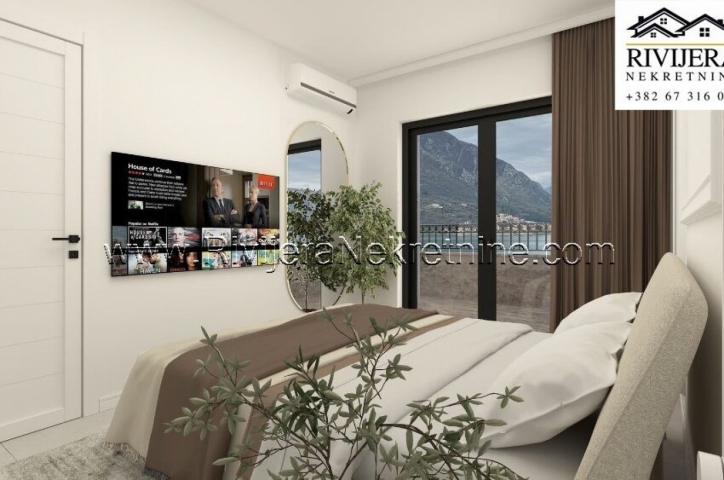 For sale luxury three-bedroom apartment with a pool in Dobrota Kotor