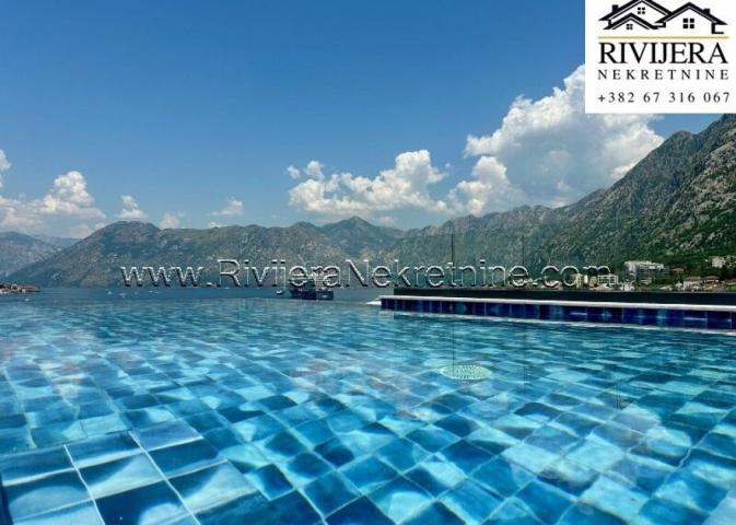 For sale luxury three-bedroom apartment with a pool in Dobrota Kotor