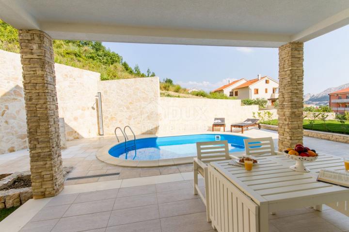 ISLAND OF KRK, BAŠKA - Beautiful semi-detached house with partial sea view in a fantastic location