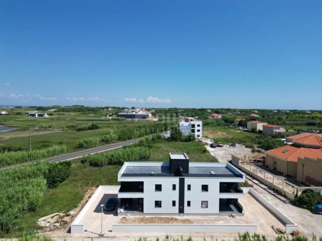 ZADAR, PRIVLAKA - New construction! Superb penthouse only 140 meters from the beach with an irresist