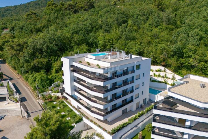 OPATIJA, ZENTRUM – luxuriöse Wohnung in einem neuen Gebäude mit Meerblick, Gemeinschaftspool, Garage