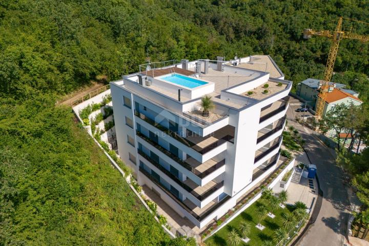 OPATIJA, ZENTRUM – luxuriöse Wohnung in einem neuen Gebäude mit Meerblick, Gemeinschaftspool, Garage