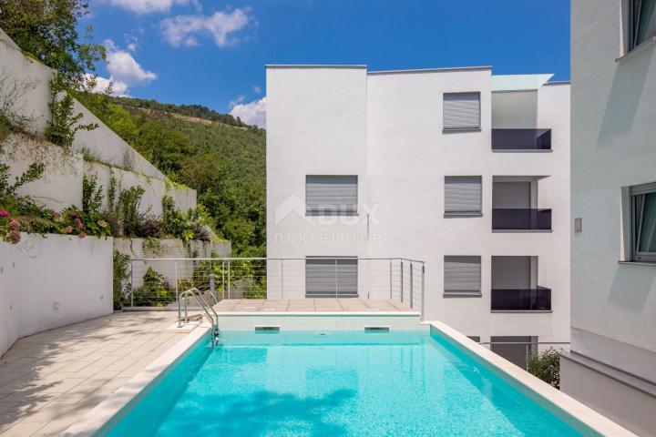 OPATIJA, ZENTRUM - moderne Wohnung in einem neuen Gebäude mit Meerblick, Gemeinschaftspool, Garage