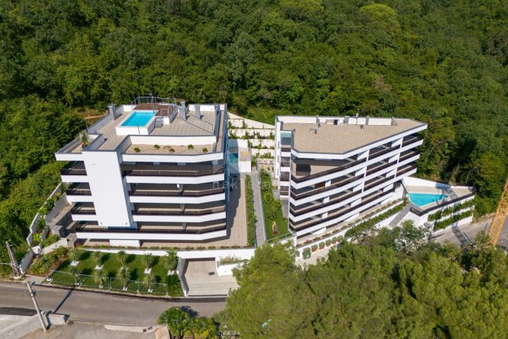 OPATIJA, ZENTRUM - moderne Wohnung in einem neuen Gebäude mit Meerblick, Gemeinschaftspool, Garage