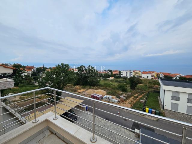 Island of Krk, Njivice - apartment "B" in a new building, 68m2