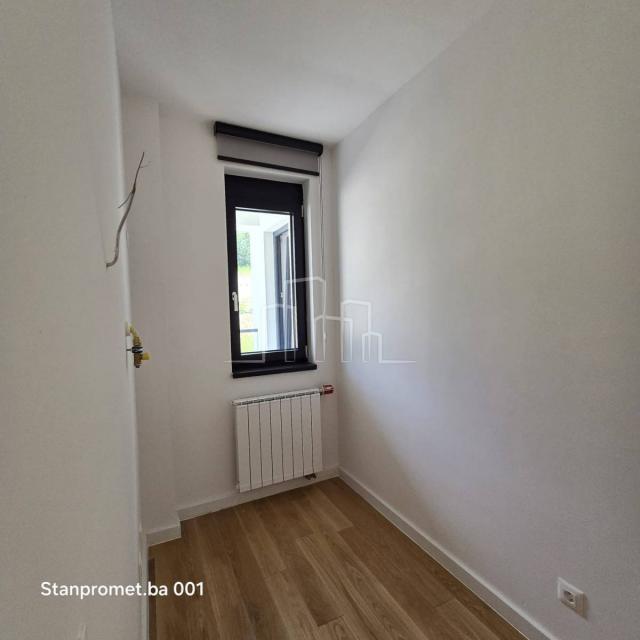 NEWLY BUILT Kromolj three-room apartment with garage for sale