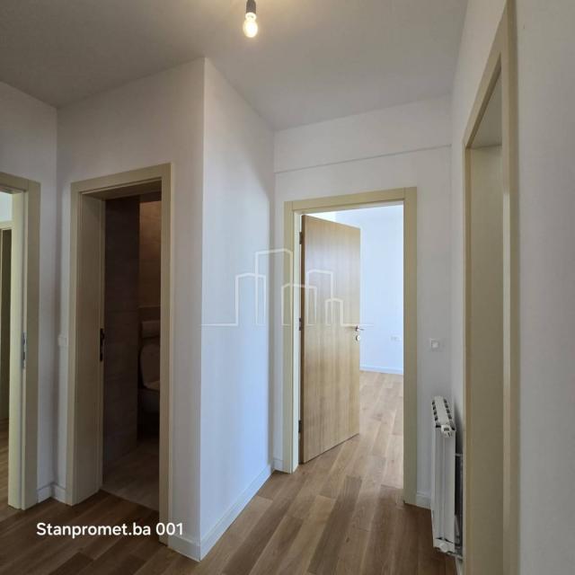 NEWLY BUILT Kromolj three-room apartment with garage for sale