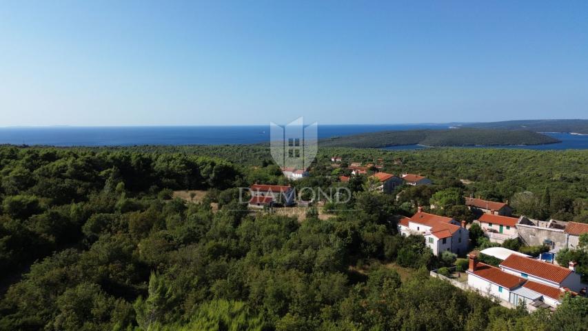 Labin, okolica, roh bau kuća s pogledom na more