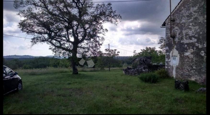 STONE HOUSE WITH LARGE BUILDING LAND