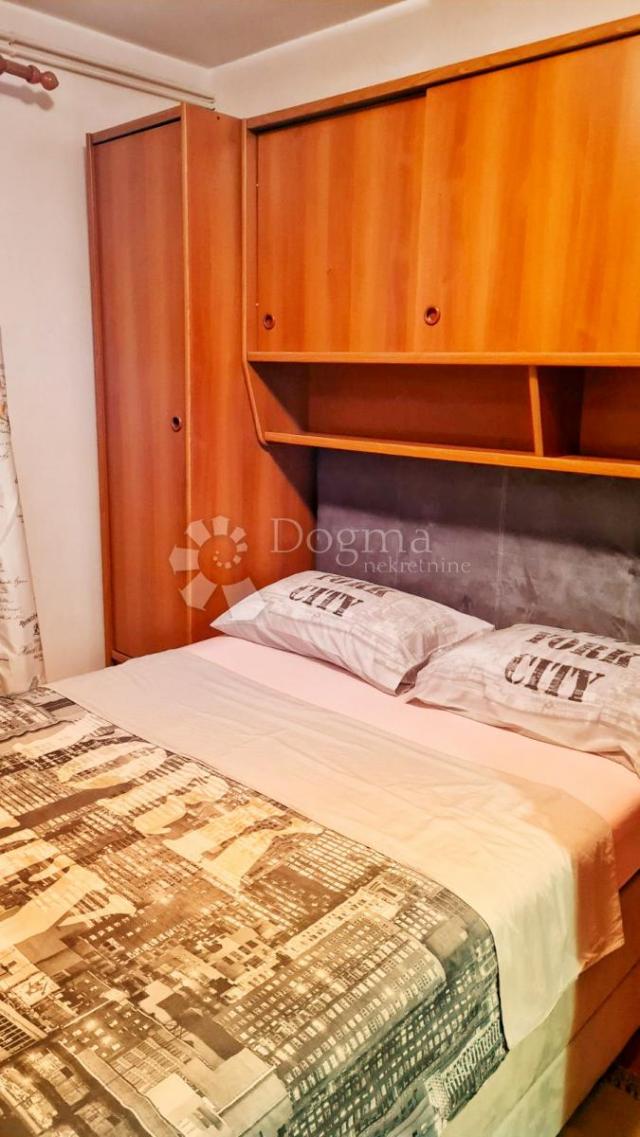 Apartmanska kuća sa predivnom okućnicom