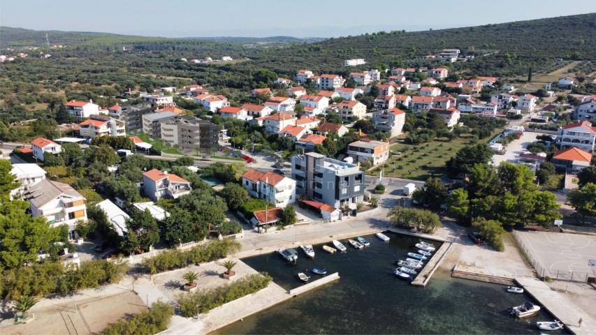 ZADAR, SUKOŠAN, 2 bedroom + bathroom apartment in a superb new building with a sea view