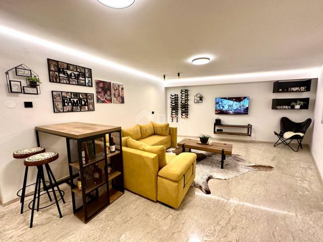 OPATIJA, CENTER - luxury floor of 300m2 in a new building with a garage, panoramic sea view