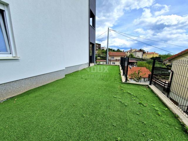 MATULJI - Wohnung in einem neuen Gebäude mit Garten