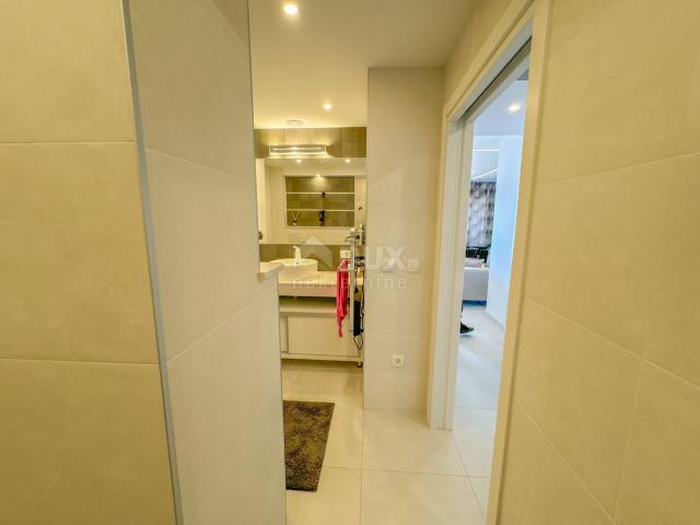 OPATIJA, CENTER - top-quality apartment in a new building with furniture, panoramic view, garage, el