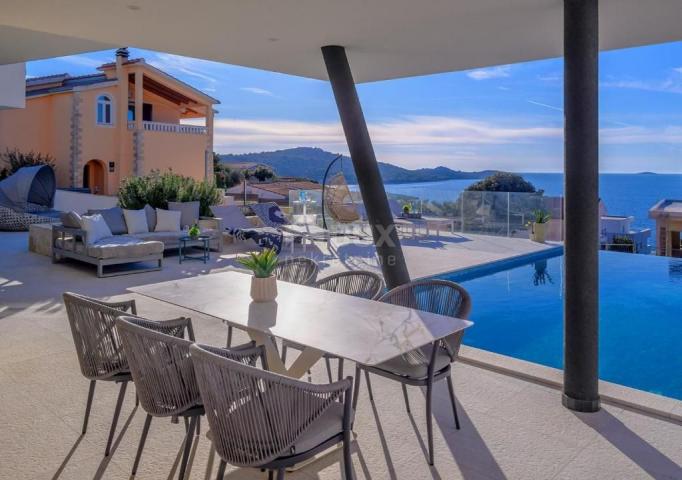 DALMATIA, ROGOZNICA Modern holiday villa with a picturesque view of the sea