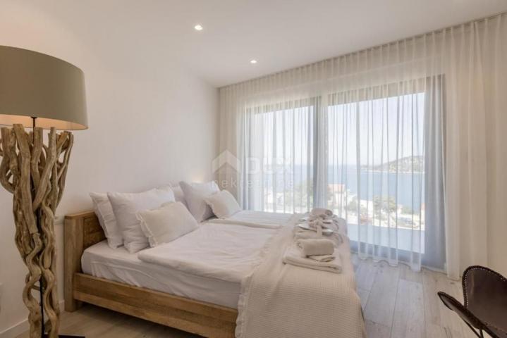 DALMATIA, ROGOZNICA Modern holiday villa with a picturesque view of the sea