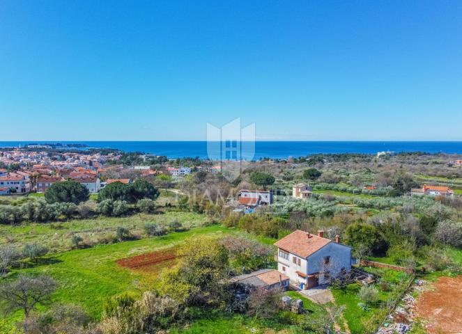 Poreč, attractive land with a sea view!