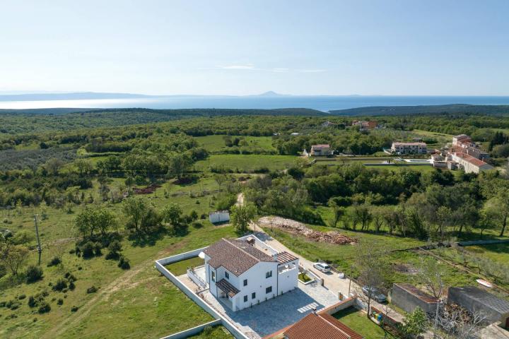 Istra, Krnica - moderna samostojeća kuća s bazenom i pogledom na more, NKP 200 m2