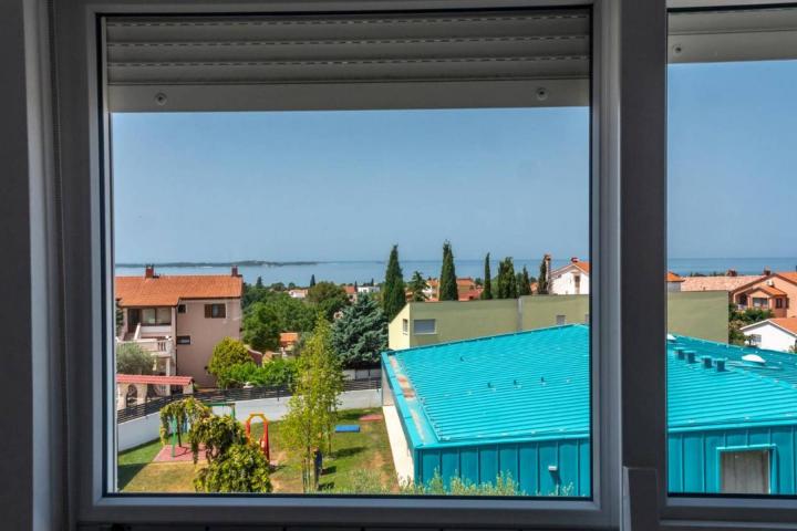 Istra, Peroj, apartmanska kuća s prekrasnom okućnicom i panoramskim pogledom na Brijune 