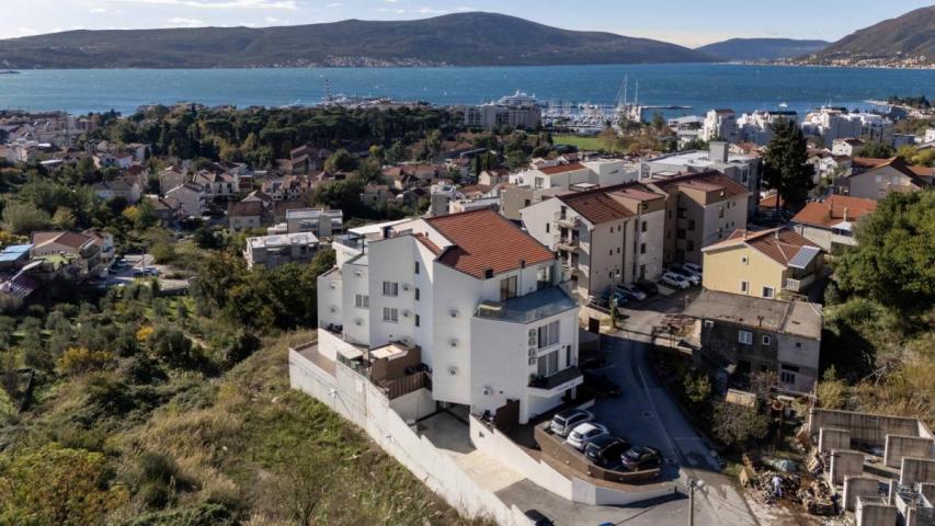 Modern two-bedroom apartment with spacious terraces and partial sea views