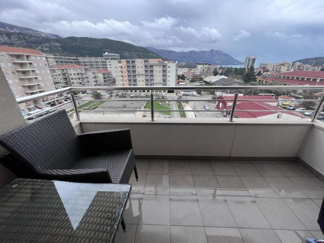 Modern 2-bedroom apartment with a sea view in Budva for sale