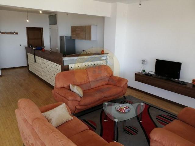 A four bedroom apartment for sale in Budva with a sea view