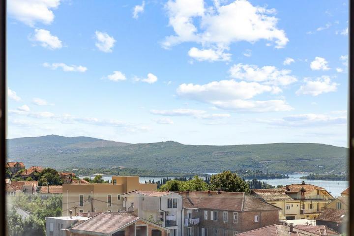 Modern two-bedroom apartment with spacious terraces and partial sea views