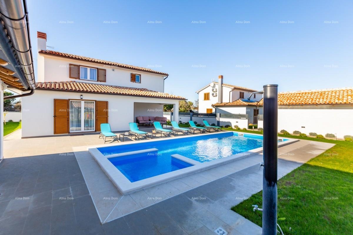 House Near the city of Pula, two new holiday homes with swimming pools.