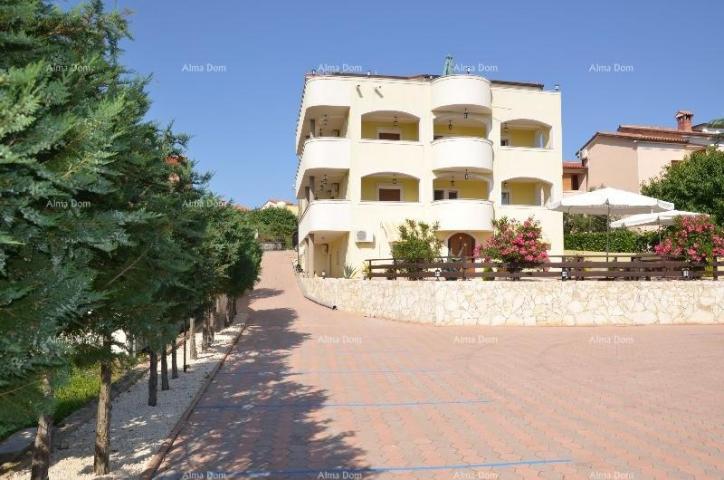 House Apartment building with pool in a great location, overlooking the sea in Medulin