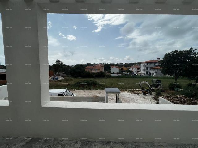 Haus Neubauprojekt in Medulin. Einfamilienhaus mit Pool und Meerblick.