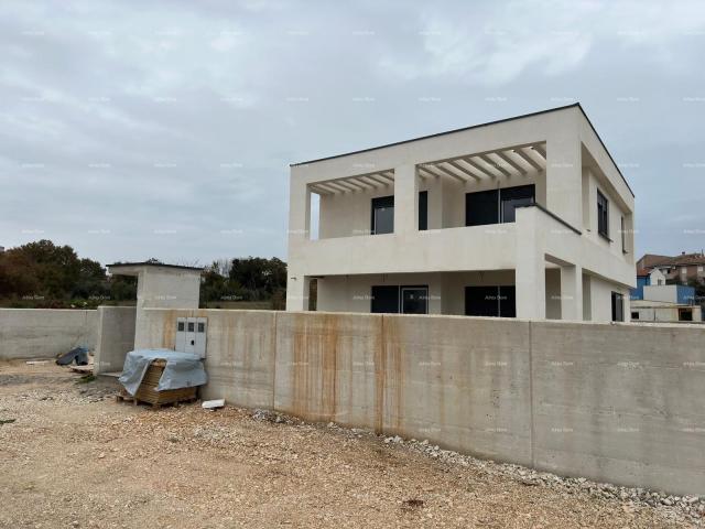 Haus Neubauprojekt in Medulin. Einfamilienhaus mit Pool und Meerblick.