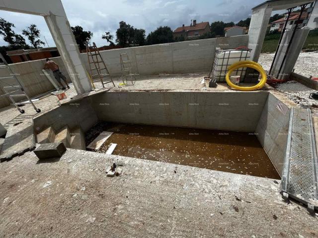 Haus Neubauprojekt in Medulin. Einfamilienhaus mit Pool und Meerblick.