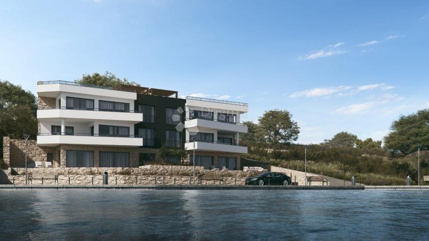 NEW BUILDING 1ST ROW TO THE SEA WITH SWIMMING POOL