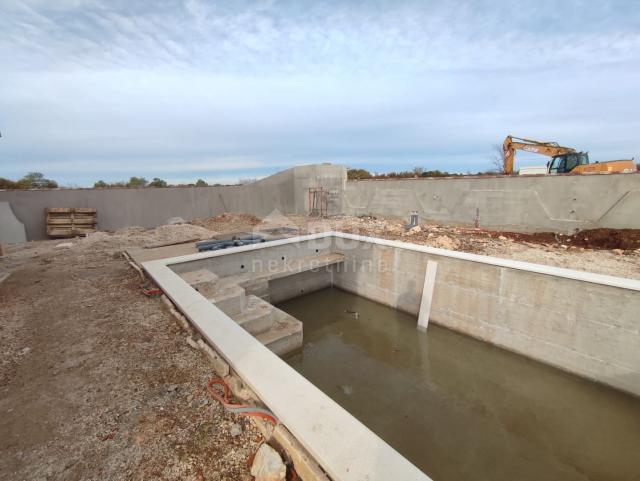 ISTRIA, VODNJAN - Semi-detached villa under construction with pool and sea view