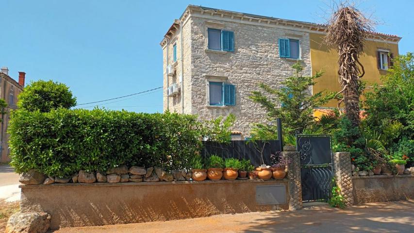 ISTRIA, MARČANA - Retro stone house in a row