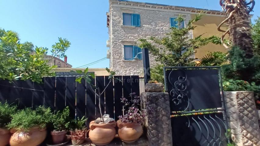 ISTRIA, MARČANA - Retro stone house in a row