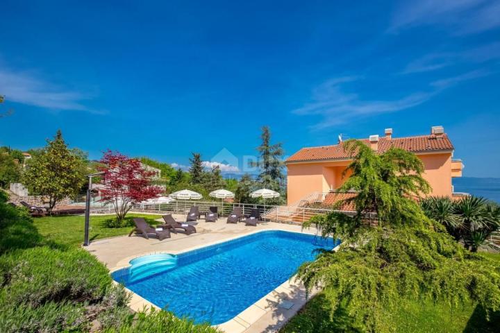 OPATIJA, LOVRAN- Apartment building of 700m2 with a swimming pool + 6000m2 of land with a project fo