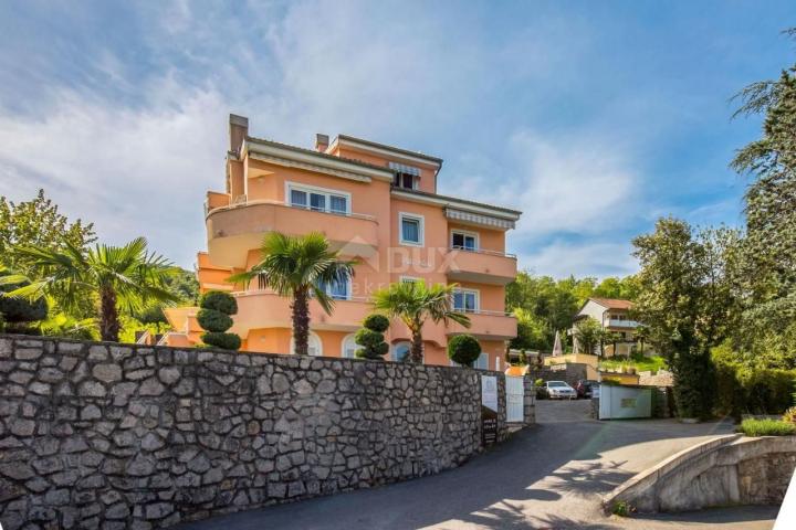 OPATIJA, LOVRAN- Apartment building of 700m2 with a swimming pool + 6000m2 of land with a project fo