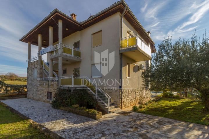 POREČ Property with two houses, swimming pool and building land