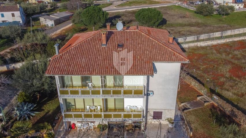 POREČ Property with two houses, swimming pool and building land