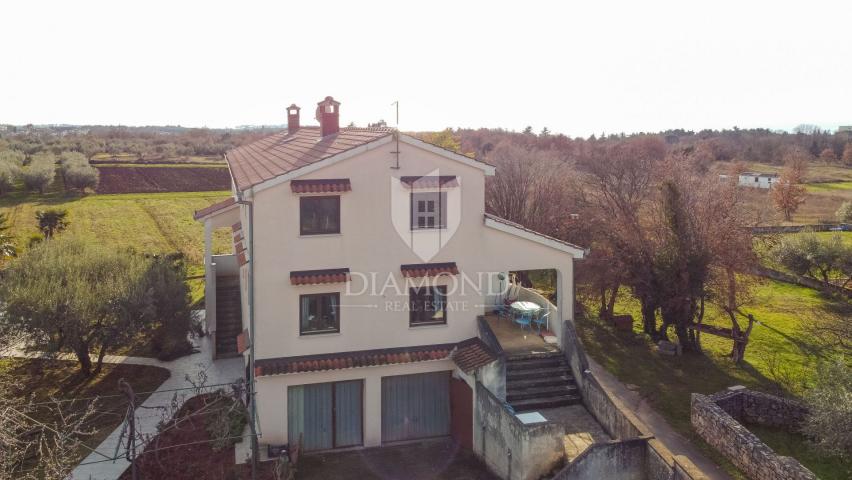 POREČ Property with two houses, swimming pool and building land