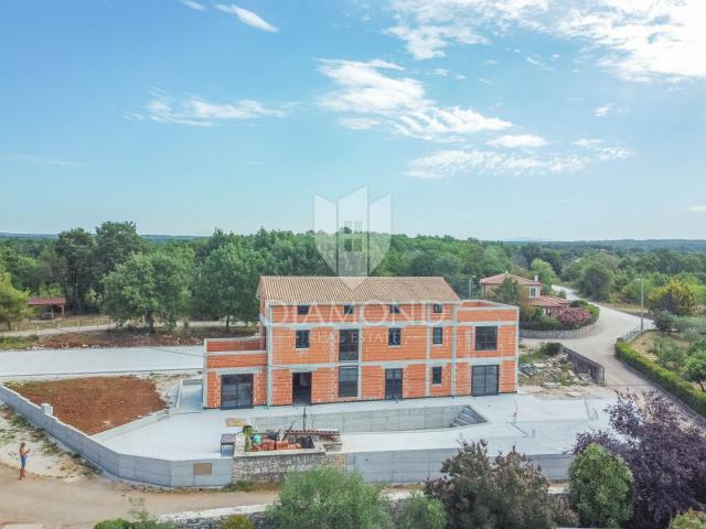 Villa with pool under construction in a quiet location