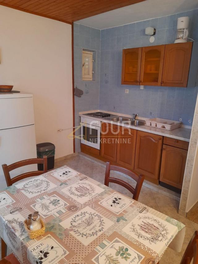 Otok Rab, Supetarska Draga, kuća s 5 apartmana, 1. red do mora