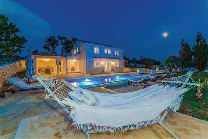 PAG ISLAND, NOVALJA beautiful stone house with swimming pool