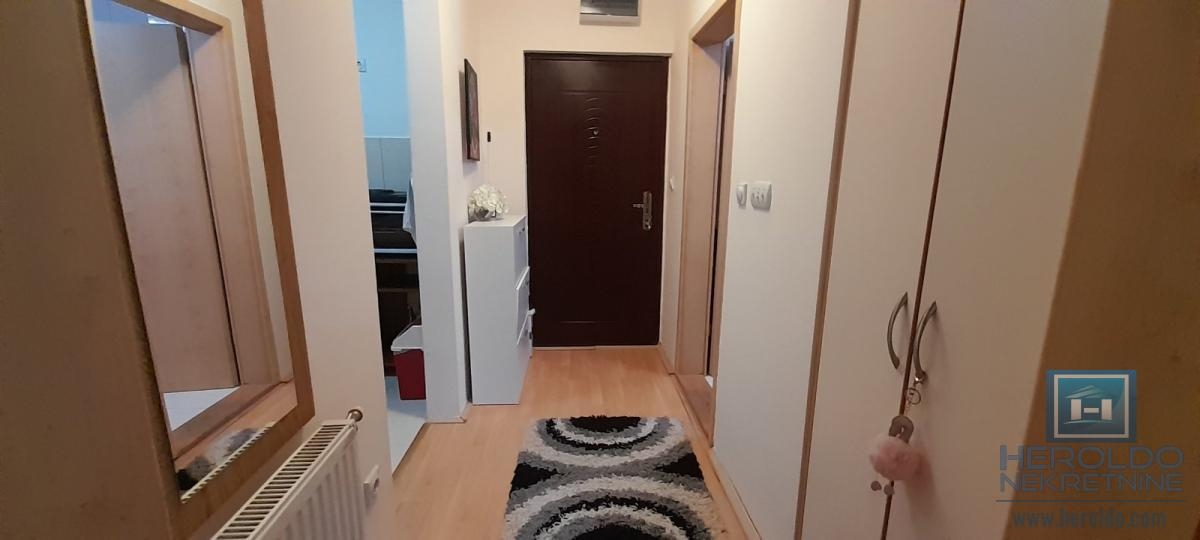 comfortable studio apartment with separate kitchen