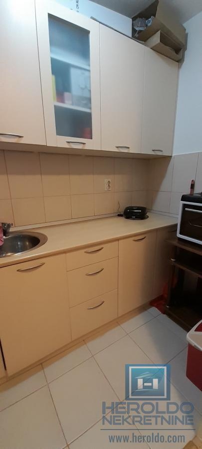 comfortable studio apartment with separate kitchen